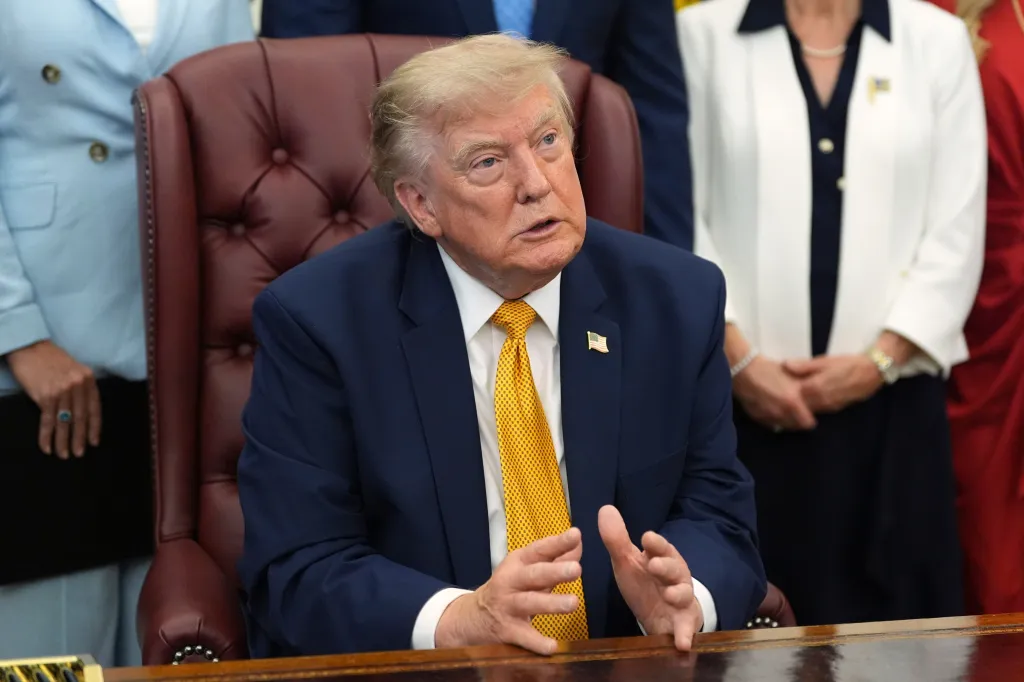President Donald Trump speaking at a meeting in the Oval Office.