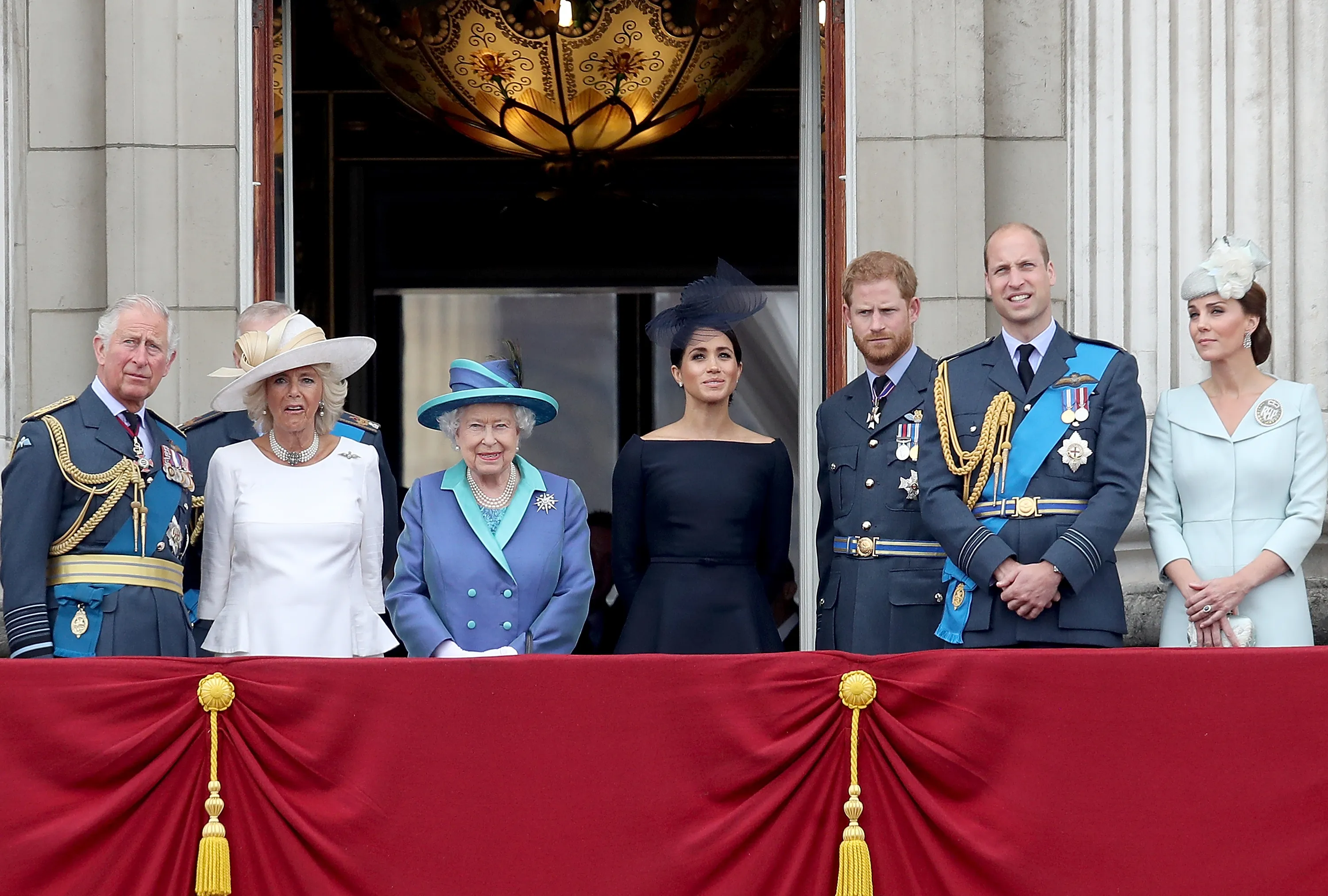 Camilla Parker Bowles, Queen Elizabeth, Meghan Markle, Prince Harry, and Prince William.