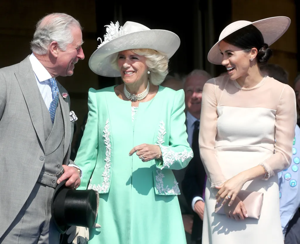 Prince Charles, Camilla, and Meghan, Duchess of Sussex, attend The Prince of Wales' 70th Birthday Patronage Celebration at Buckingham Palace.