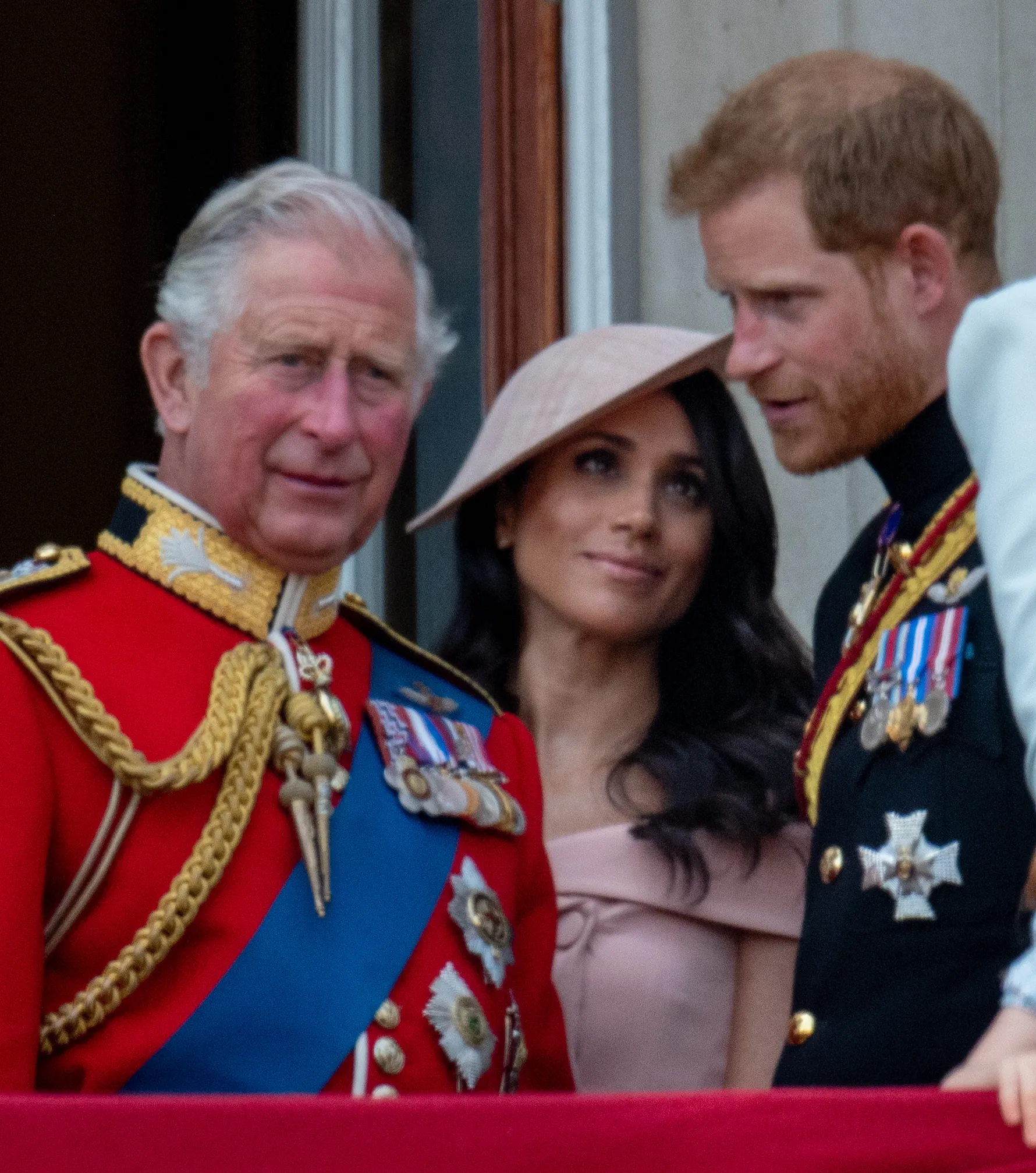 Prince Charles, Prince Harry, and Meghan, Duchess of Sussex at Trooping The Colour 2018.