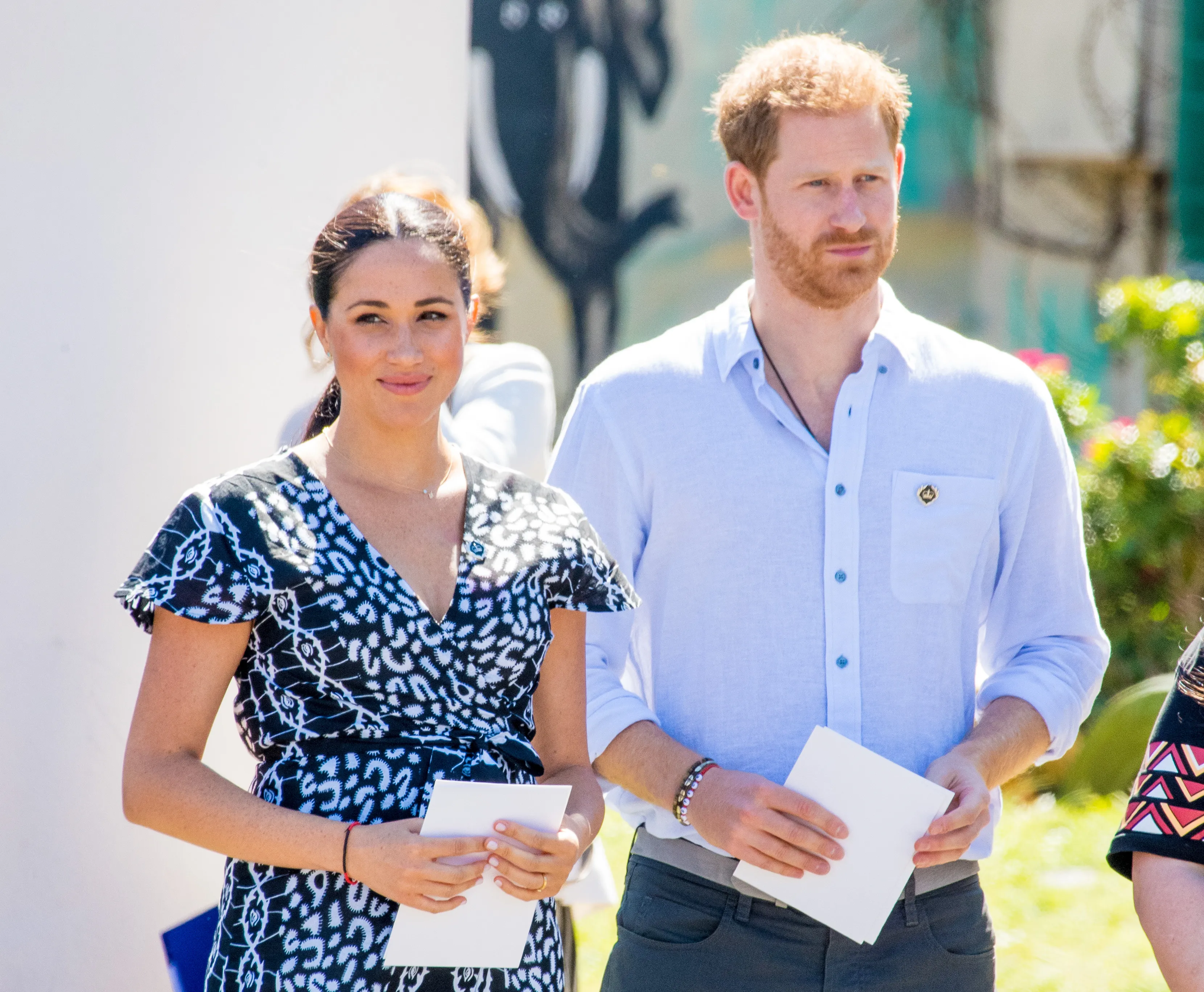 Prince Harry and Meghan Markle standing together.