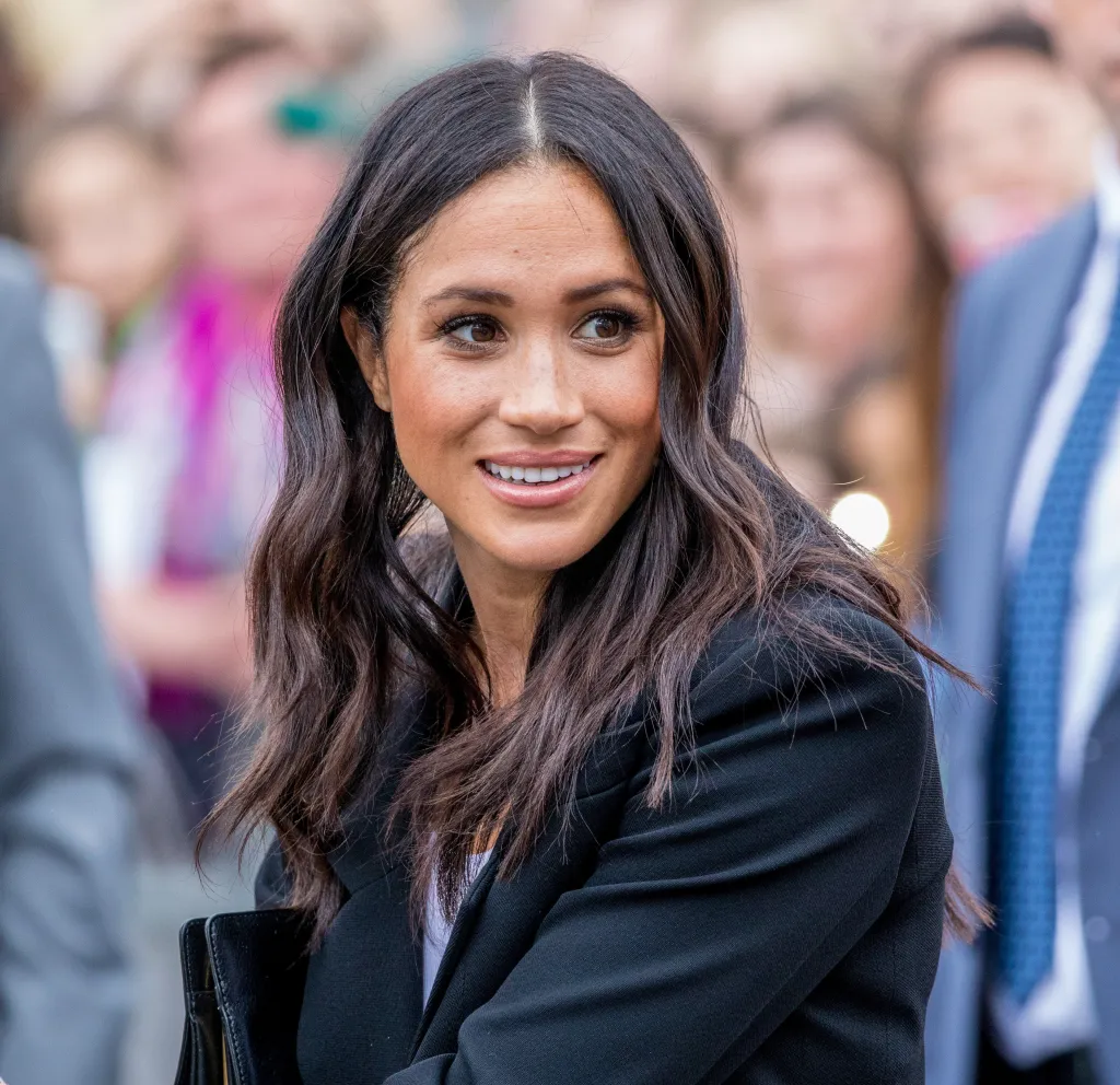 Meghan Markle, Duchess of Sussex, smiling.