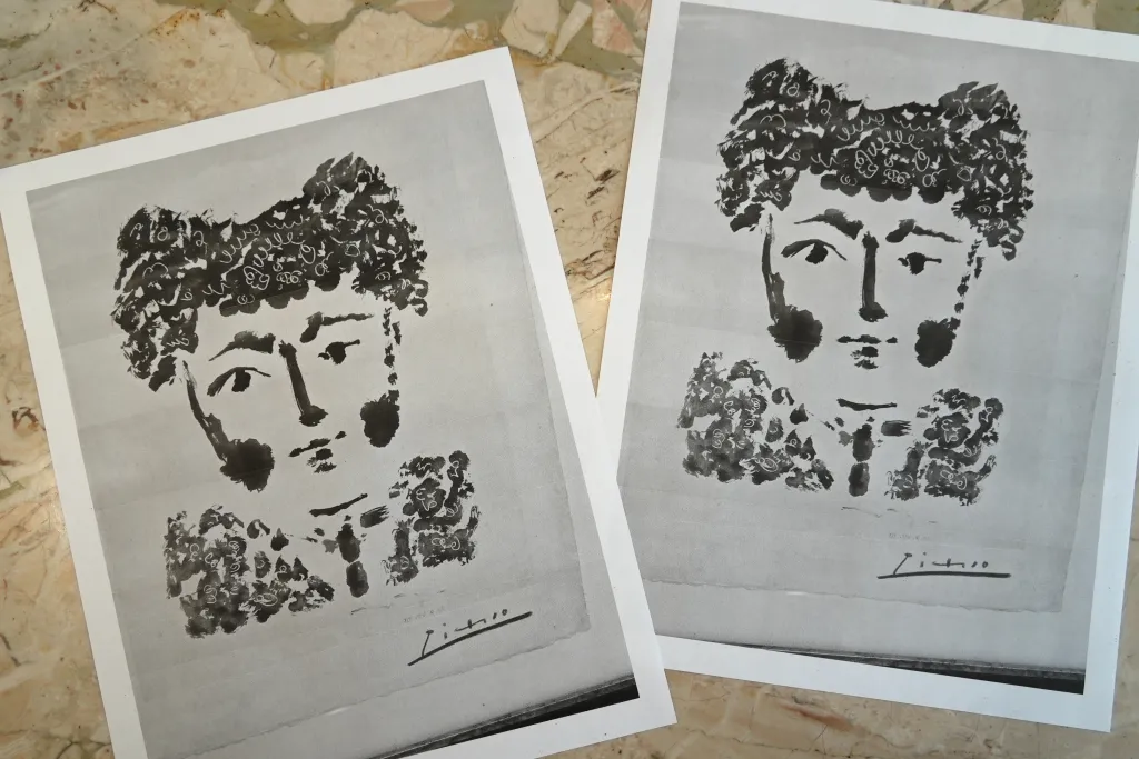 Printouts of the stolen Pablo Picasso etching,