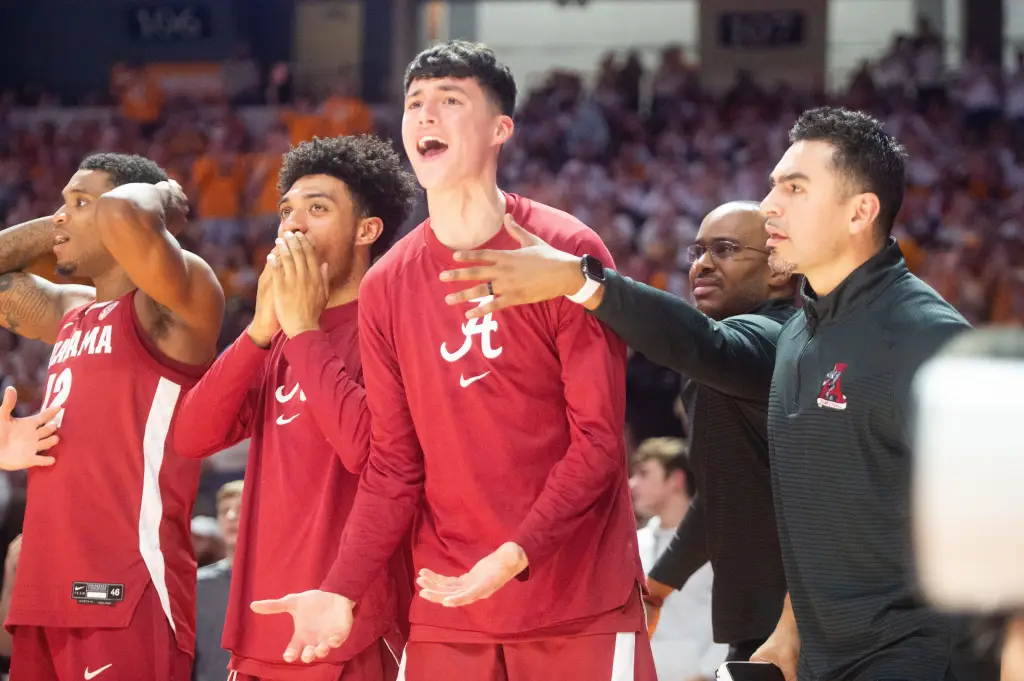 Kai Spears (center) protests a foul call with teammates during an Alabama game against Tennessee.