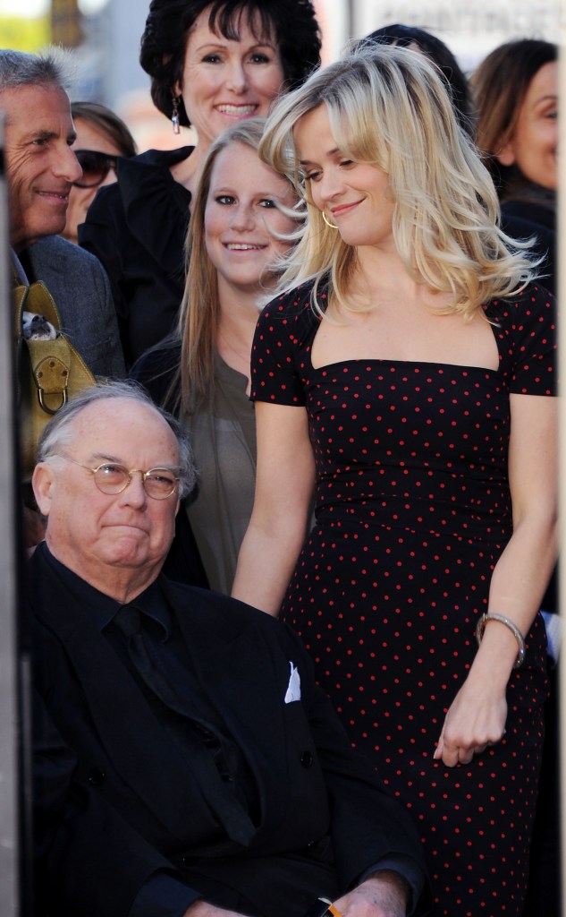 Reese Witherspoon and her father, Dr. John Witherspoon, pose for a photo.