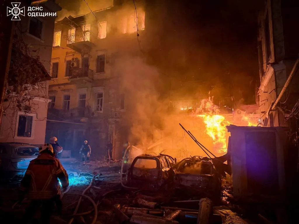 Rescuers work at apartment buildings damaged during a Russian missile and drone strike in Odesa, Ukraine.