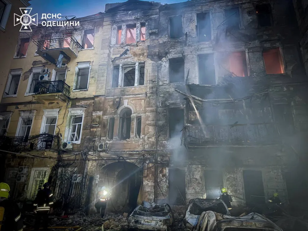 Rescuers work at apartment buildings damaged during a Russian missile and drone strike in Odesa, Ukraine.