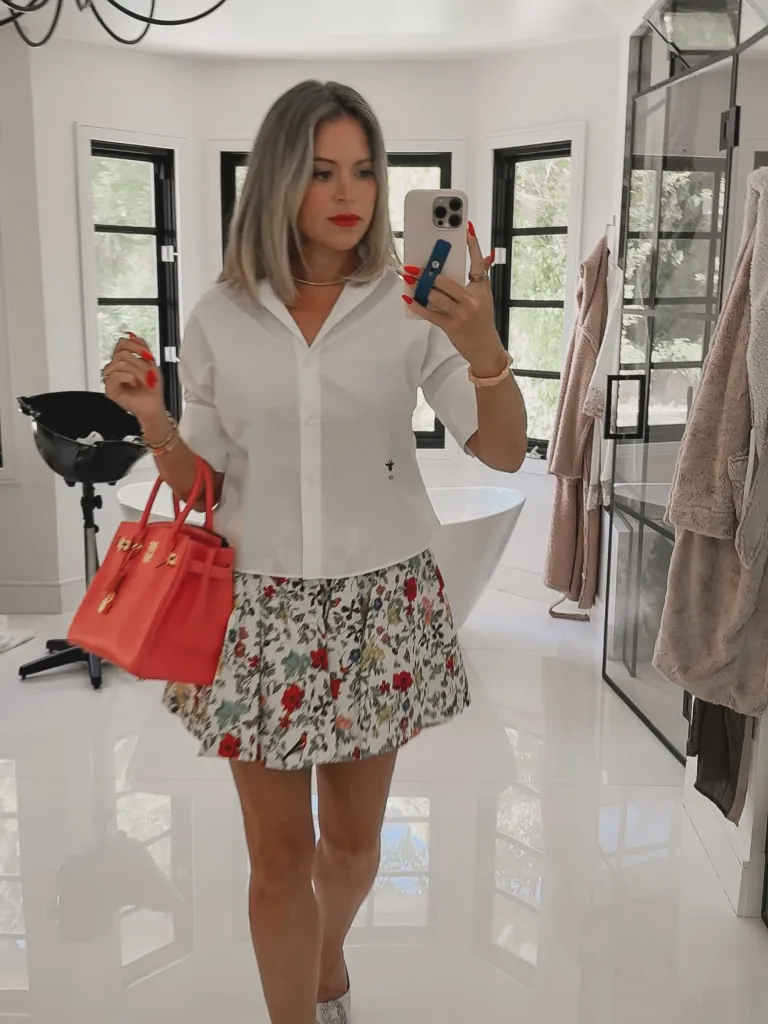 Amanda Frances taking a mirror selfie.