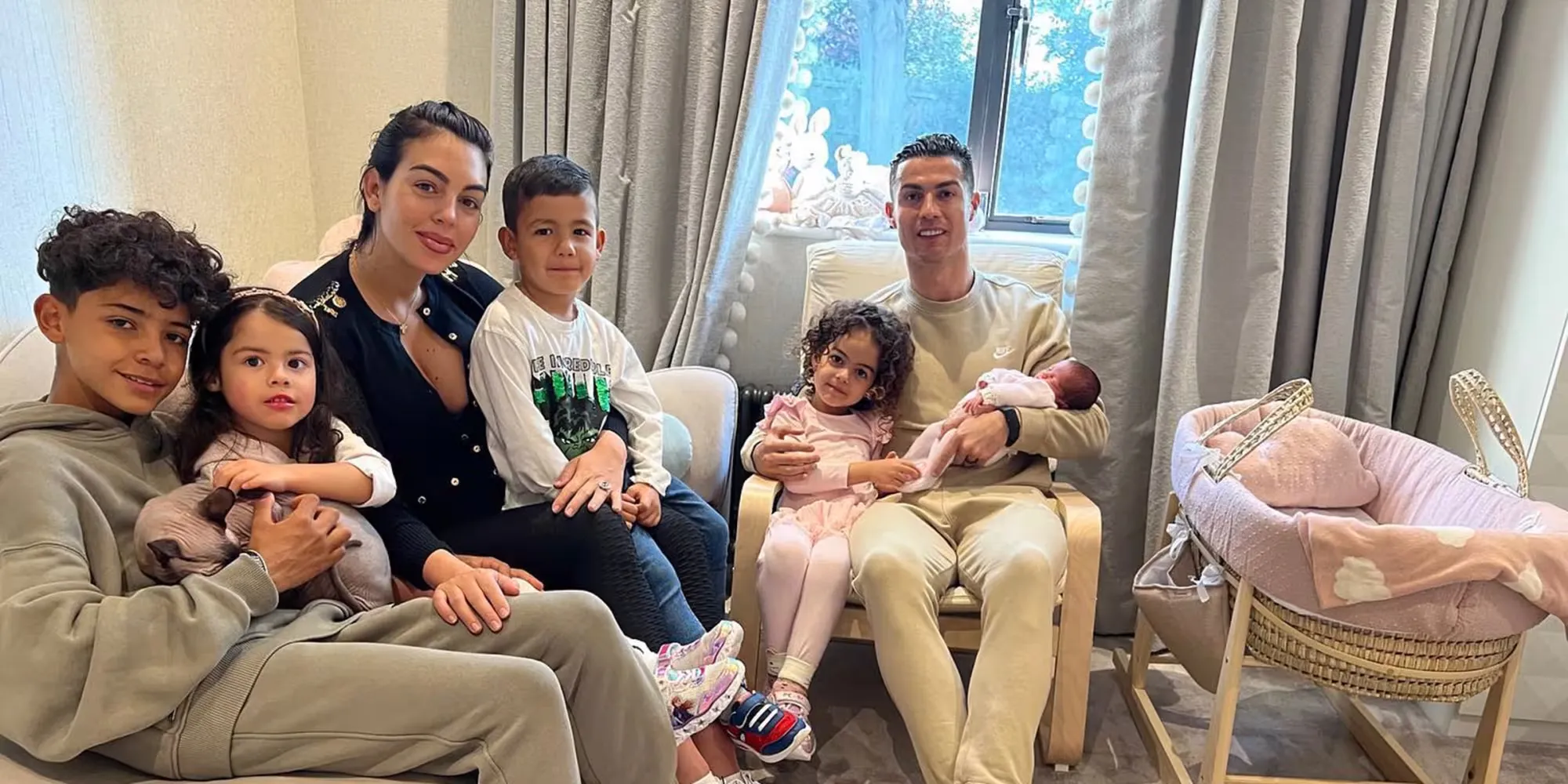 Cristiano Ronaldo and Georgina Rodriguez pose with their five children.