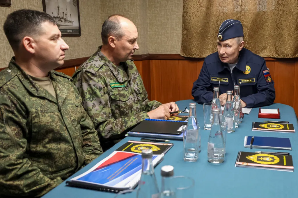 Russian President Vladimir Putin speaks to navy officers on board a missile cruiser on Aug. 13, 2026.