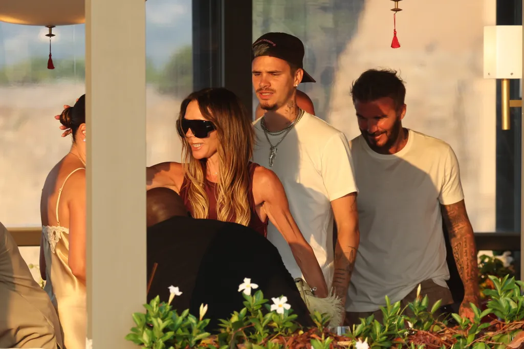 Victoria Beckham, Romeo Beckham, and David Beckham during a yacht day in Saint-Tropez.