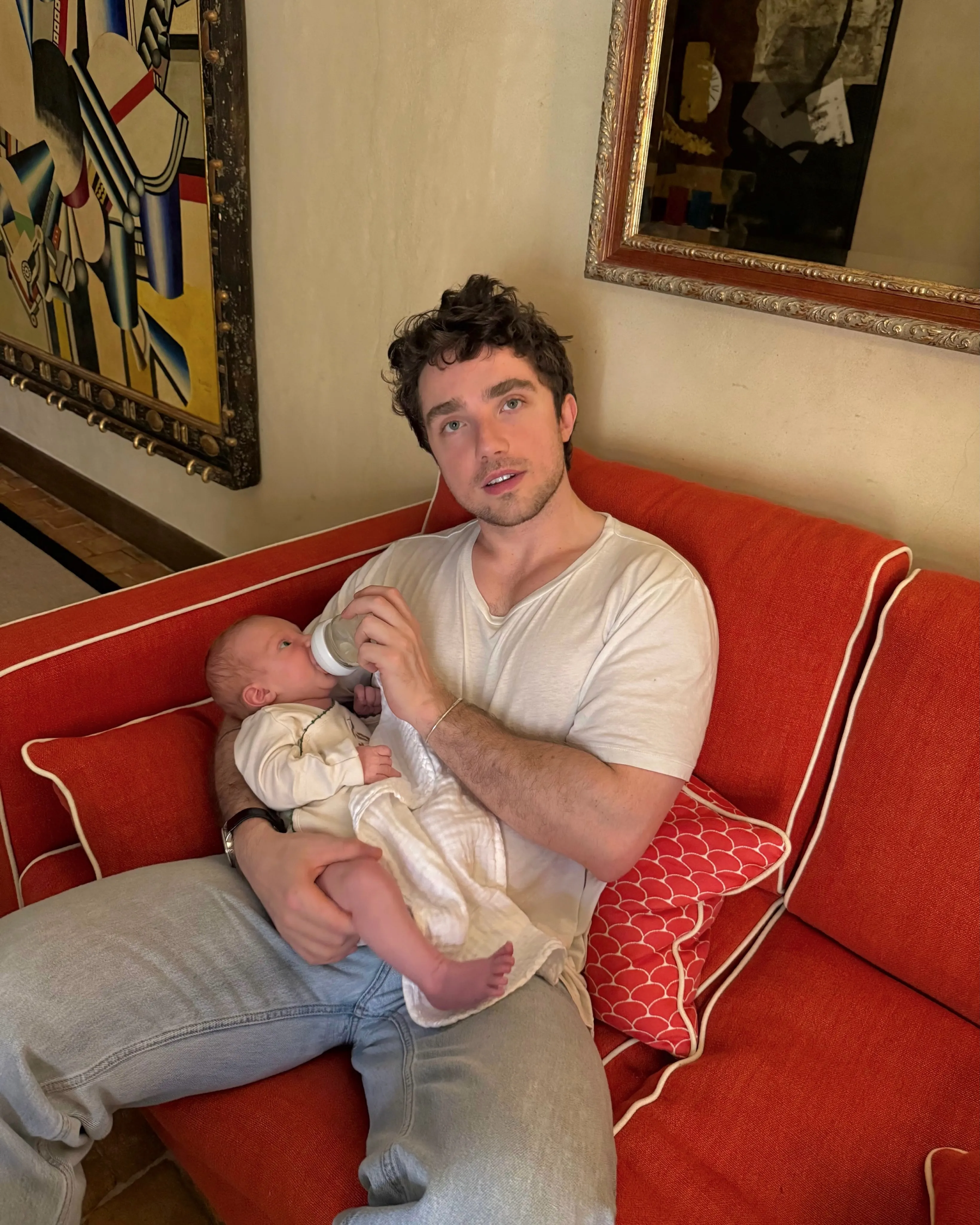 François Pinault Jr. feeding his son.