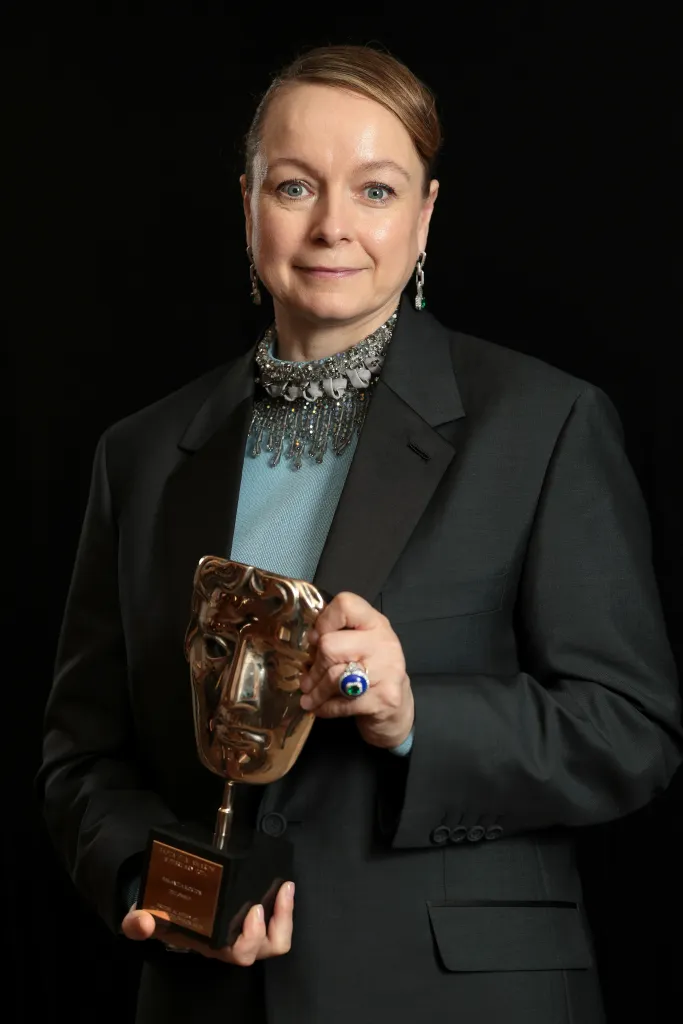 Samantha Morton posing with the BAFTA Fellowship Award.