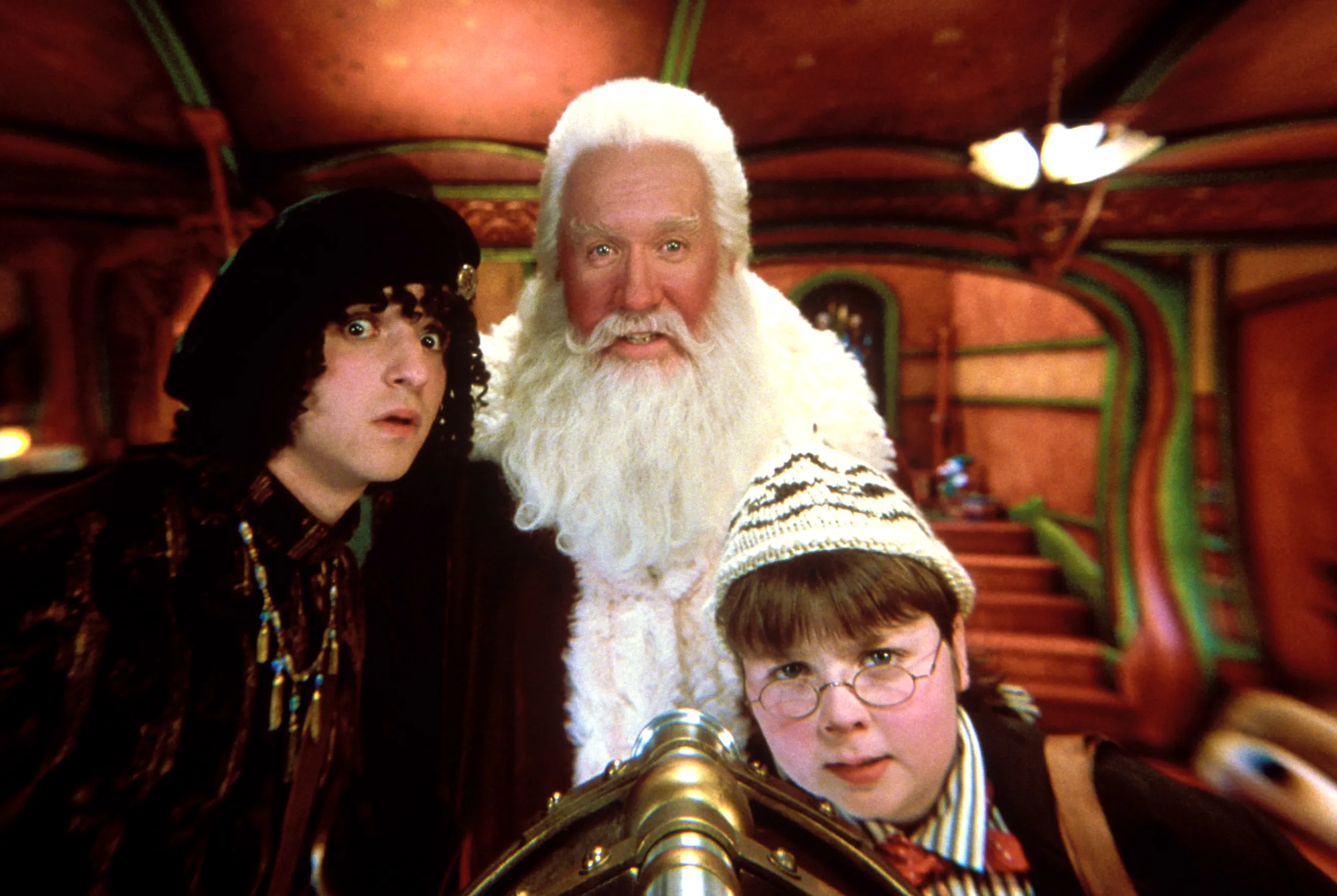 Tim Allen as Santa Claus, David Krumholtz, and Spencer Breslin in a scene from