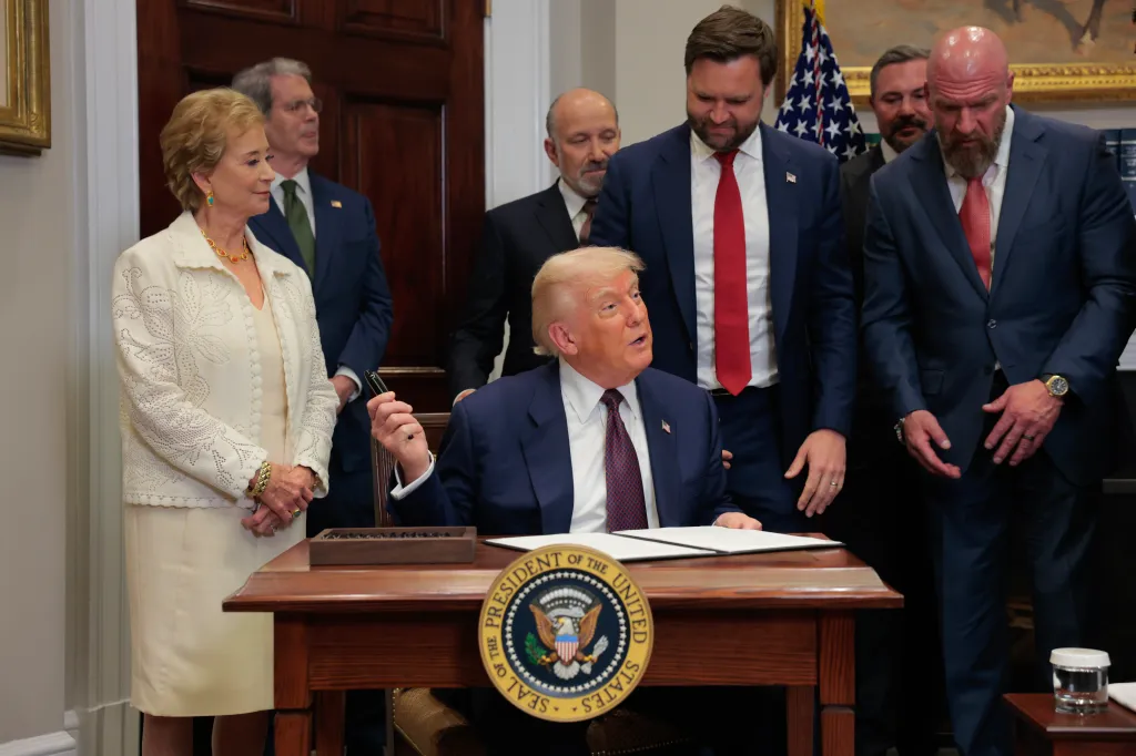 Donald Trump at the White House surrounded by Linda McMahon, Scott Bessent, Howard Lutnick, JD Vance, and Paul 
