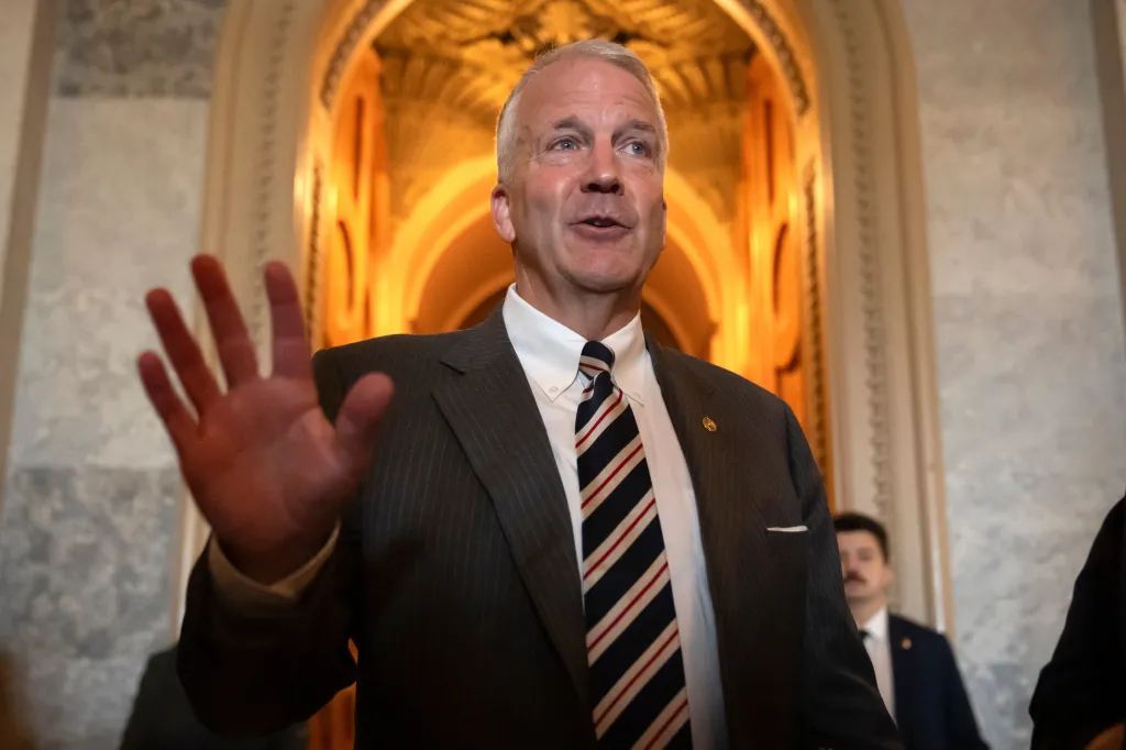 Sen. Dan Sullivan speaks to reporters.
