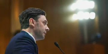 Crowd erupts as Trump foe mocks his MAGA ‘scandal piñata’ opponent
