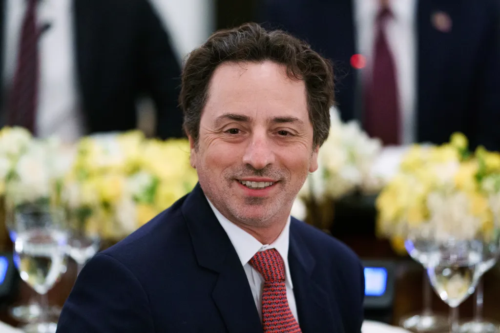 Sergey Brin, president of Alphabet and co-founder of Google Inc., smiling during a dinner with tech leaders in the State Dining Room of the White House.