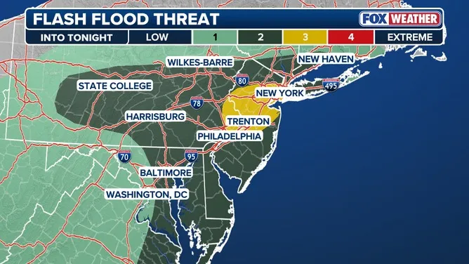 Map illustrating a flash flood threat for the Mid-Atlantic and Northeast US, with New York, Trenton, and Philadelphia under a moderate threat.