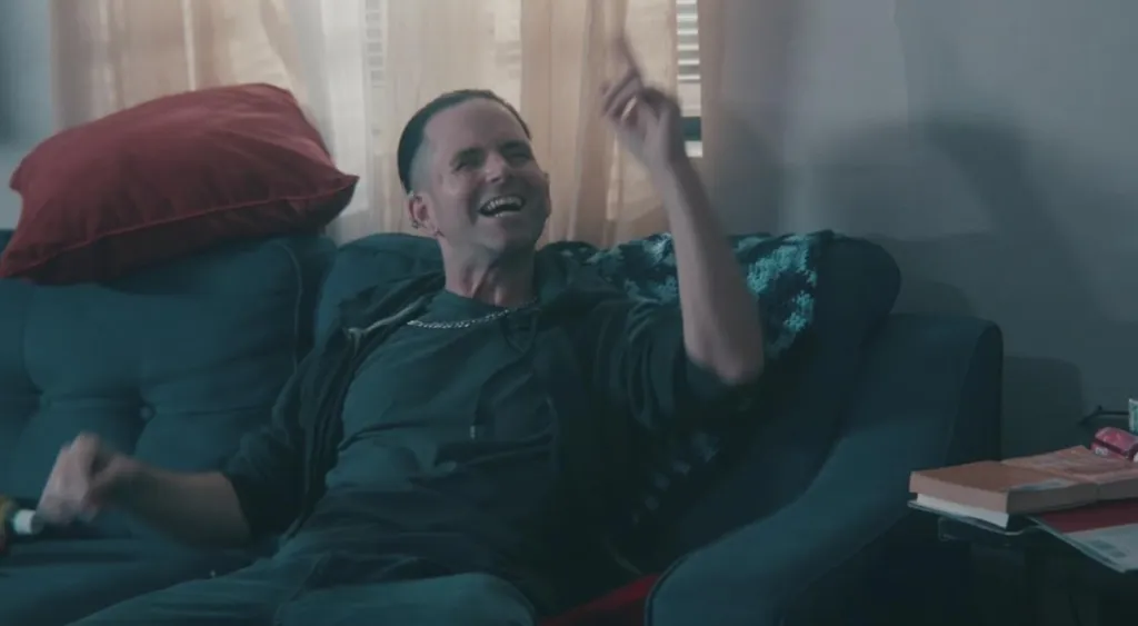 Shane Ryan-Reid laughing while pointing up in