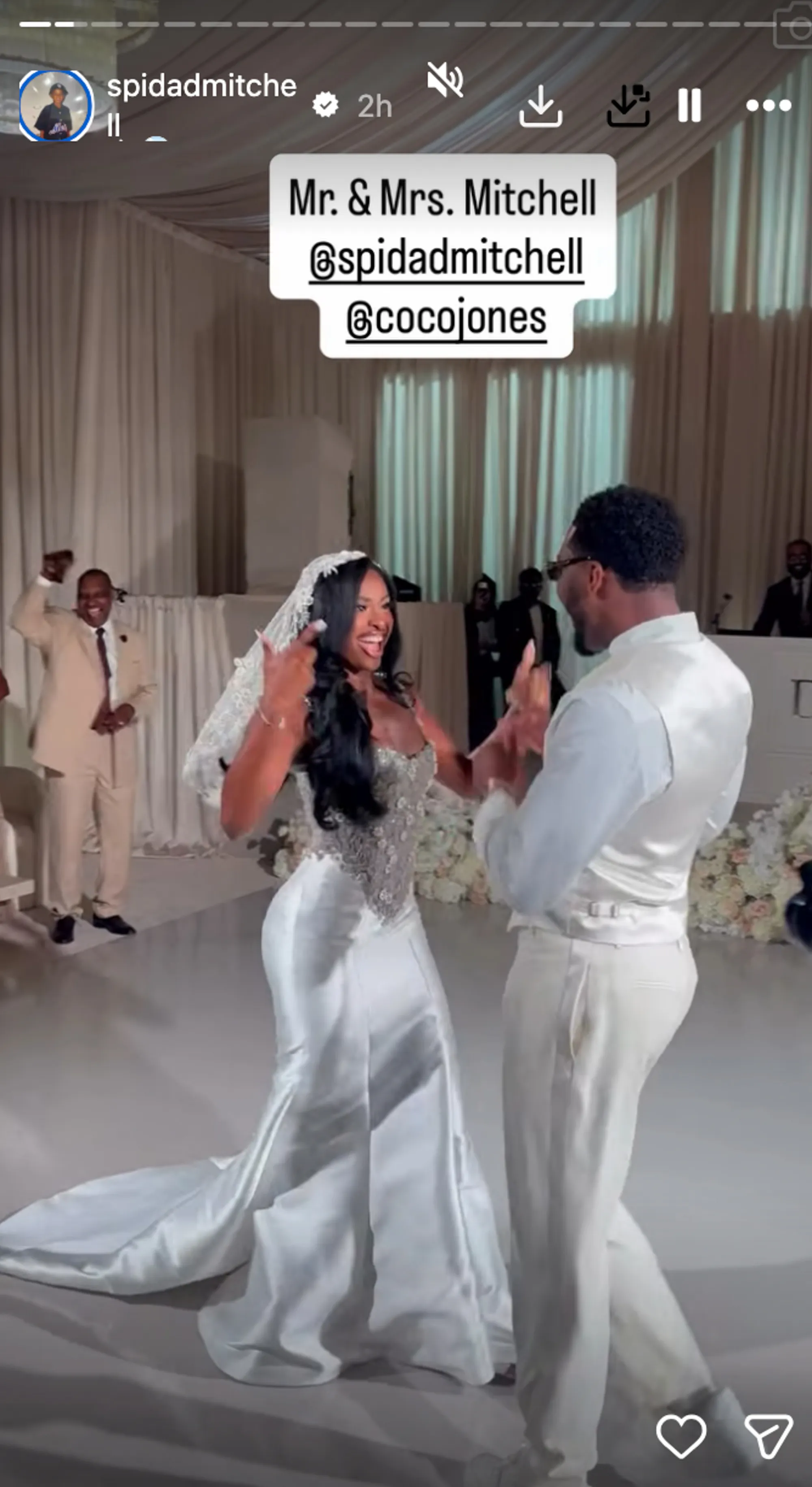 Coco Jones and Donovan Mitchell dancing at their wedding.