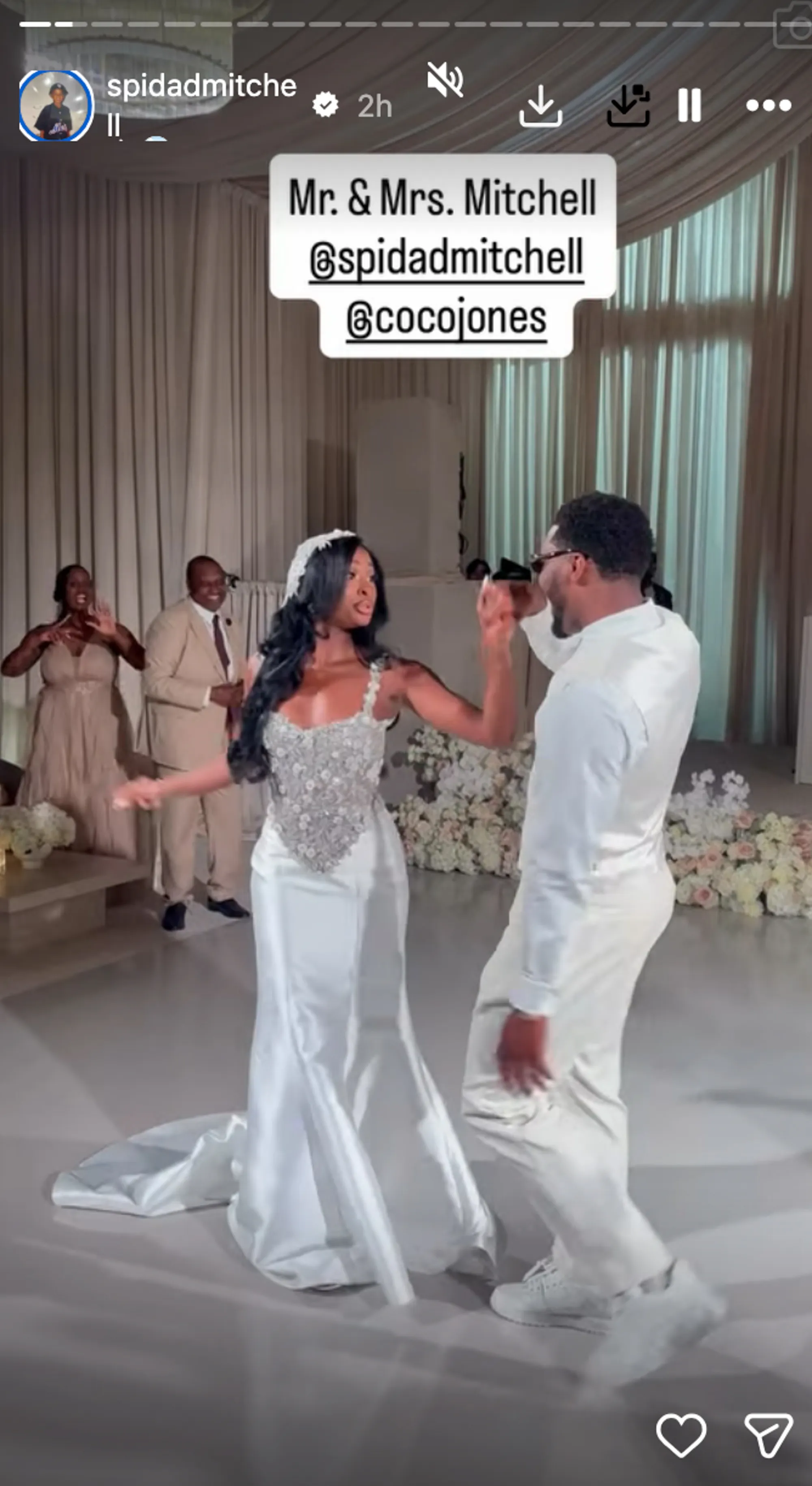 Singer Coco Jones and NBA star Donovan Mitchell dancing at their wedding.