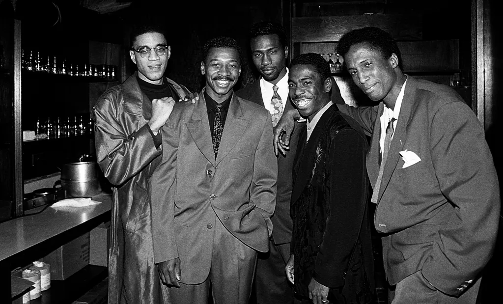 Harry J. Lennix, Robert Townsend, Leon Robinson, Tico Wells, and Michael Wright of The Five Heartbeats posing for a photo.