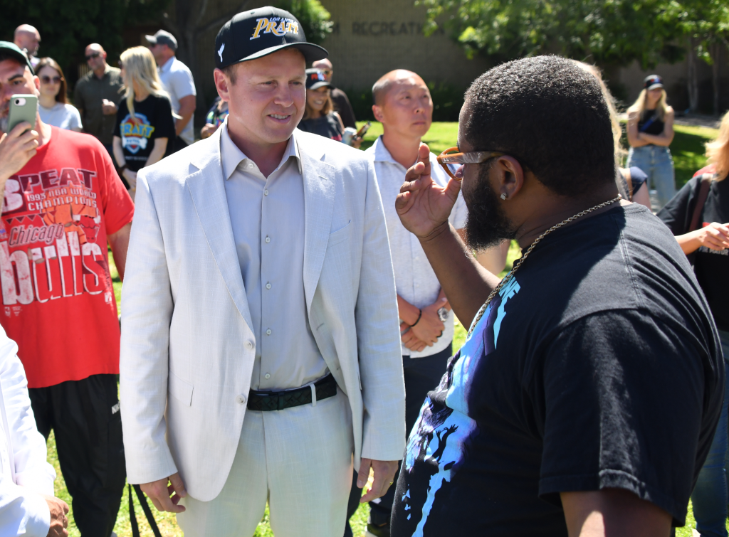 Spencer Pratt, mayoral candidate, speaking with a voter in Tim Gilliam Park.