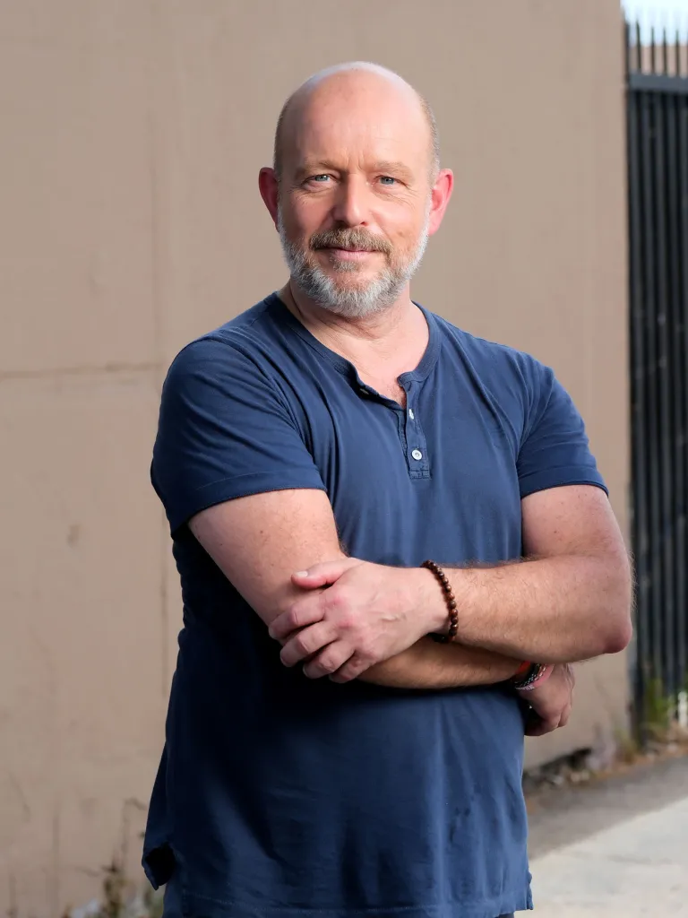 Steve Hilton, a candidate for Governor of California, with his arms crossed.