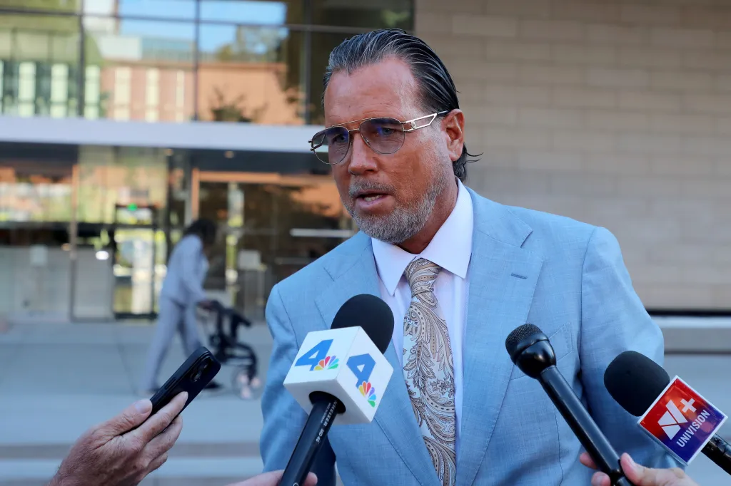 Defense attorney Steven Haney speaks to the press outside court.