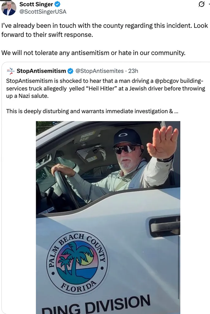 A man in a Palm Beach County building-services truck making a Nazi salute.