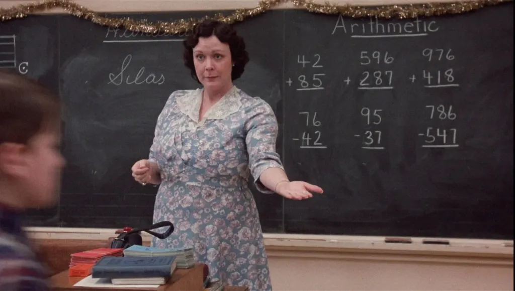 Tedde Moore as Ralphie's teacher in 