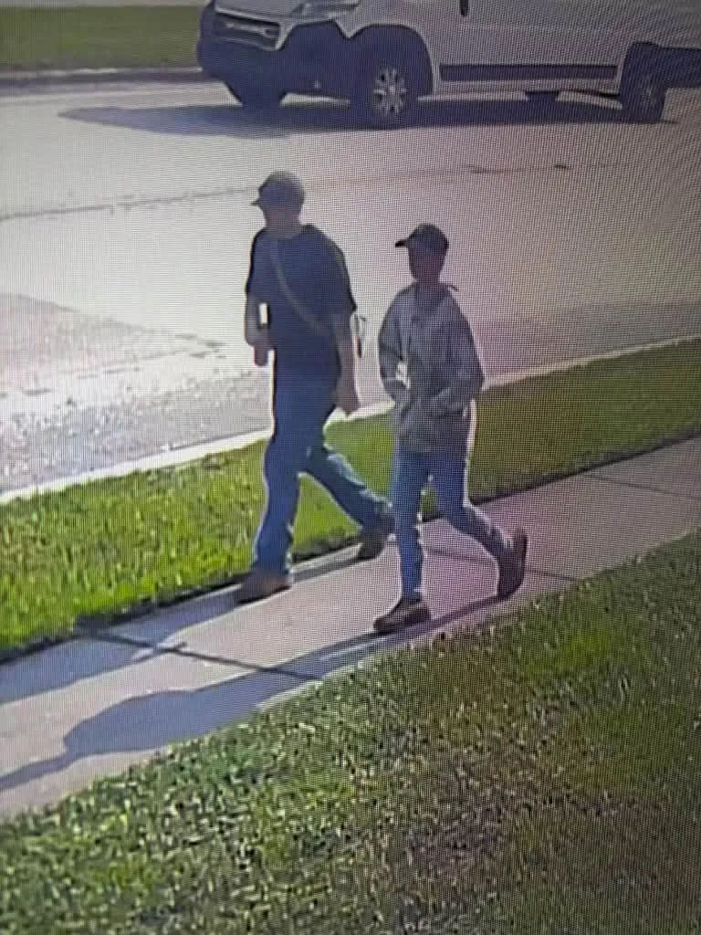 Dustin Rose and Samson Campbell pictured walking together before they were found shot to death.