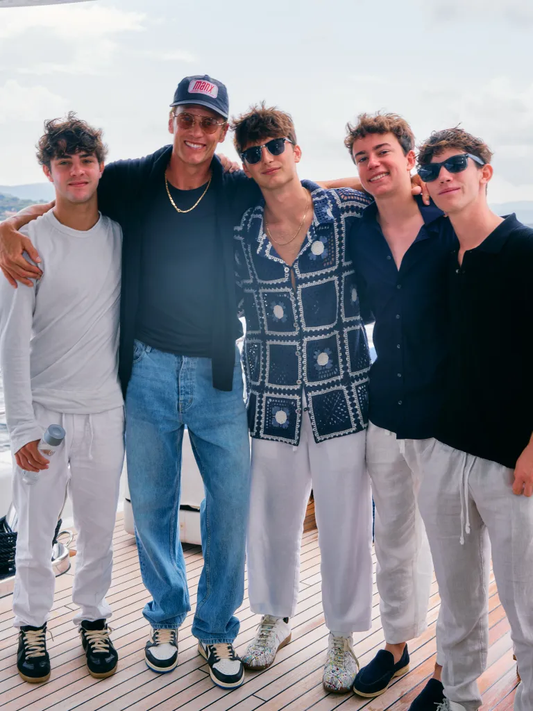 Tom Brady with his four sons on a yacht.