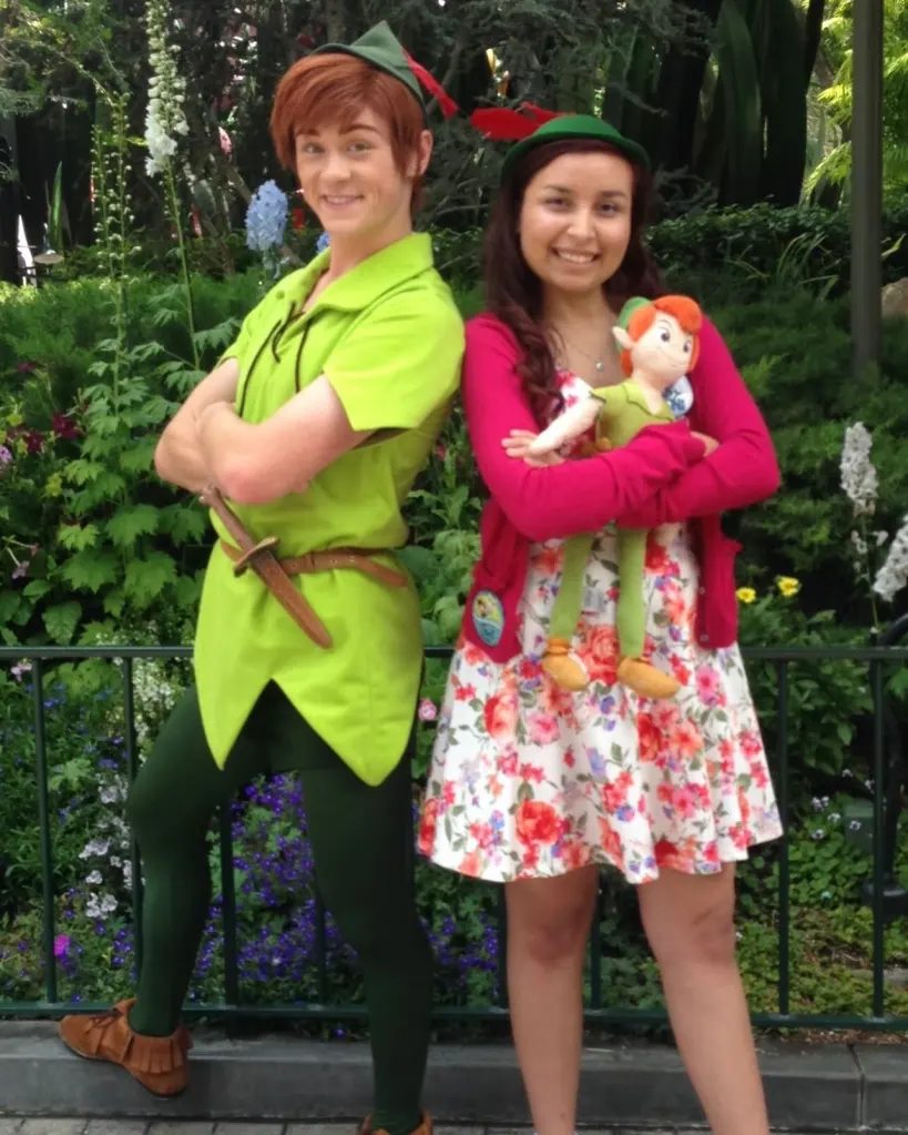 Toni Kulusich, a Disney adult, with a person dressed as Peter Pan.
