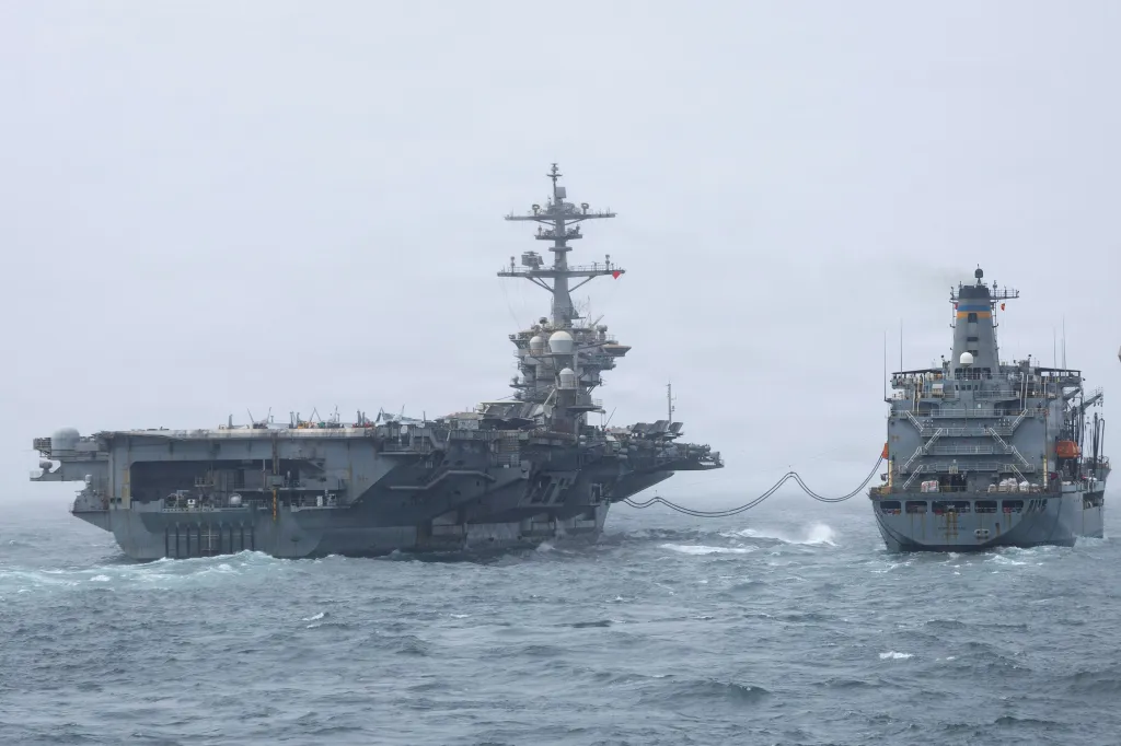 The USS Abraham Lincoln aircraft carrier refueling with the USNS Henry J. Kaiser.
