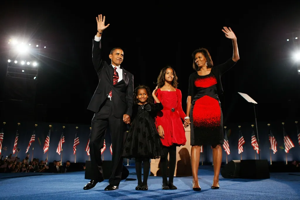 President-elect Barack Obama stands on stage with his wife Michelle and daughters Malia and Sasha during an election night gathering in Grant Park in Chicago, Illinois, on November 4, 2008.