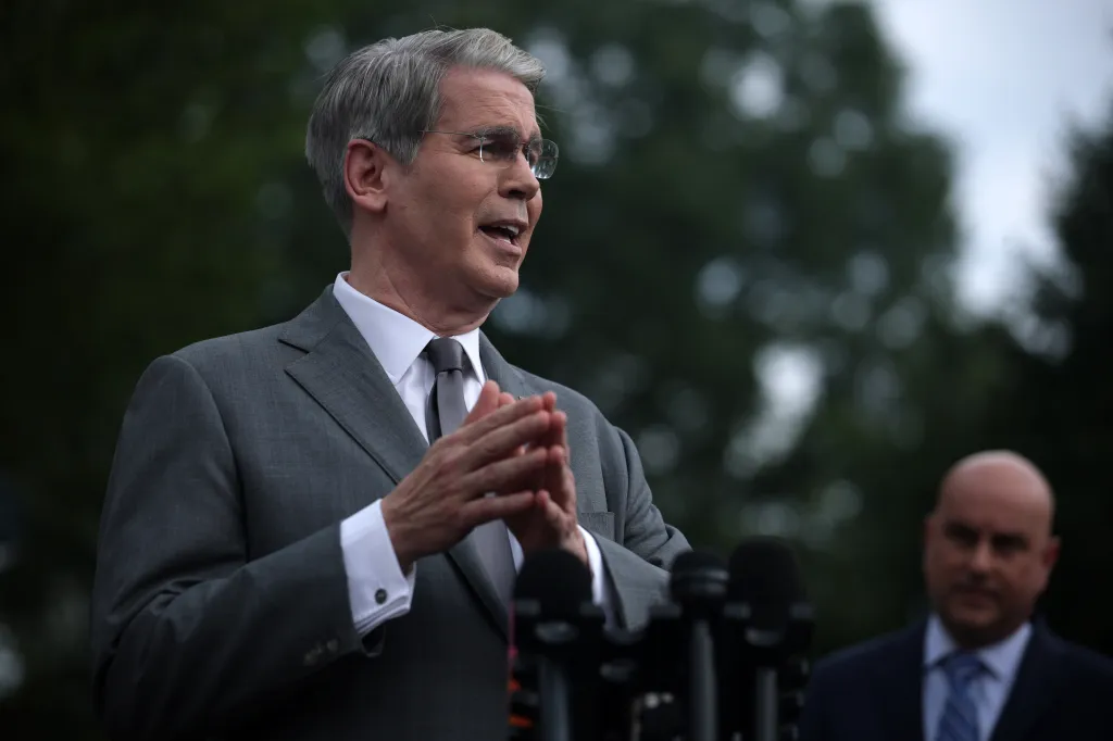 Treasury Secretary Scott Bessent speaks to media outside the White House.