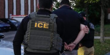 Trump remains unpopular, but Republicans still back him on immigration, poll shows