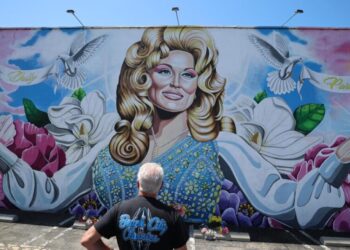 ‘A voluptuous sex symbol.’ Judge invokes Dolly Parton in overturning Texas ‘drag ban’