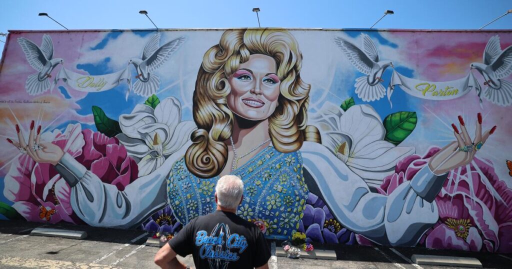 ‘A voluptuous sex symbol.’ Judge invokes Dolly Parton in overturning Texas ‘drag ban’