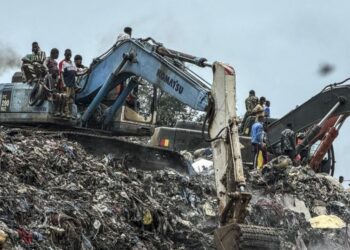 A landslide at a landfill in the capital of Guinea kills at least 22 people, officials say