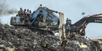 A landslide at a landfill in the capital of Guinea kills at least 22 people, officials say