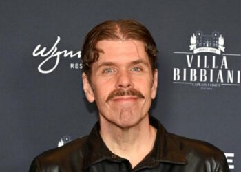 Perez Hilton remains hospitalized as his website resumes activity