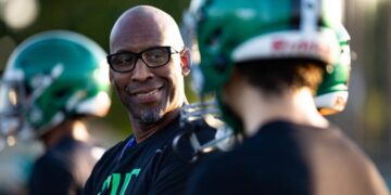 ‘An obligation to give back.’ Former NFL players are reshaping high school football
