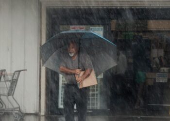 Lala weakens to tropical storm, but rain and winds batter Hawaii