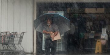 Lala weakens to tropical storm, but rain and winds batter Hawaii