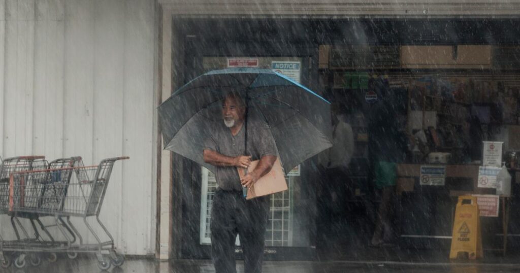 Lala weakens to tropical storm, but rain and winds batter Hawaii