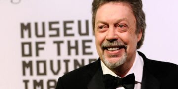 Tim Curry’s British charm and Cheshire grin were made for comedy. These 7 TV roles show why