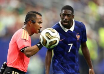A World Cup referee shares his view of red cards, hydration breaks and soccer history